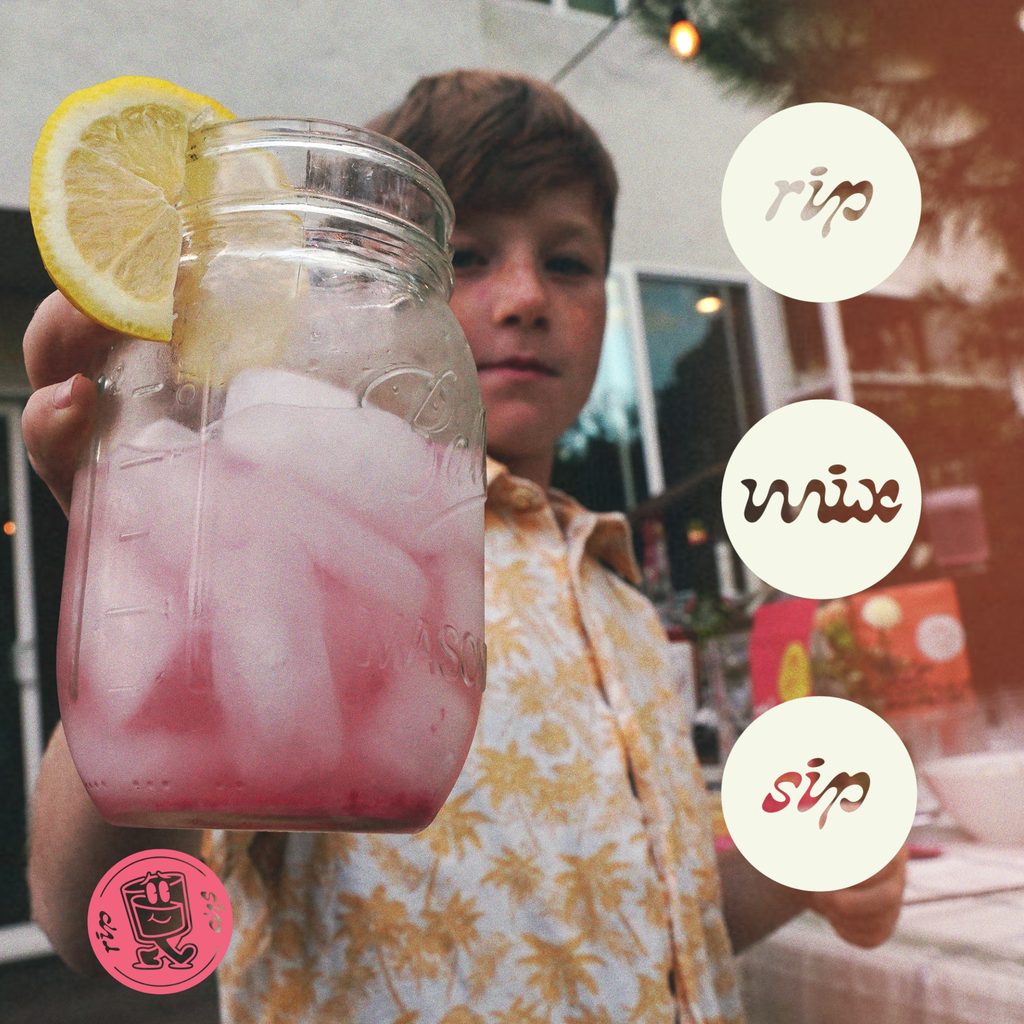Kid holding a mocktail Stir Sessions Raspberry Lemonade powdered iced drink in a mason jar with lemon slices, with 'rip mix sip' text and logos.