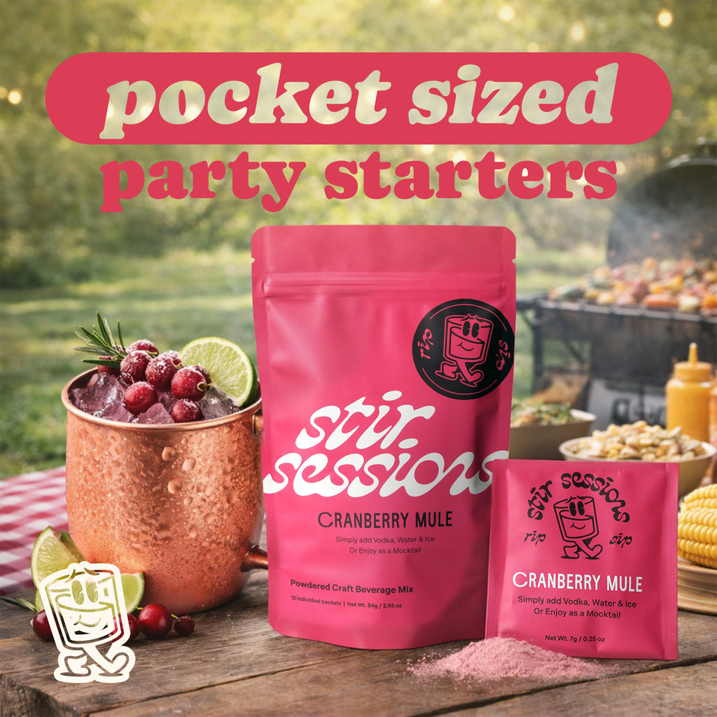 Stir Sessions Cranberry Mule powdered cocktail or mocktail drink beverage packaging with a cocktail and ingredients on a wooden table.