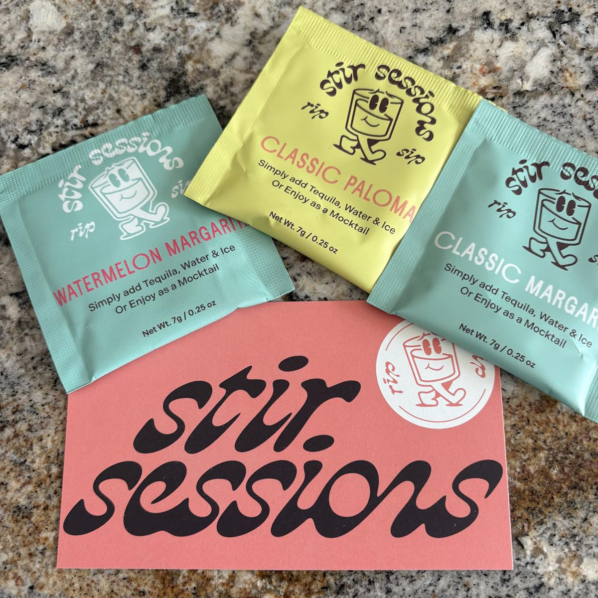 Stir Sessions cocktail mix packets on a countertop