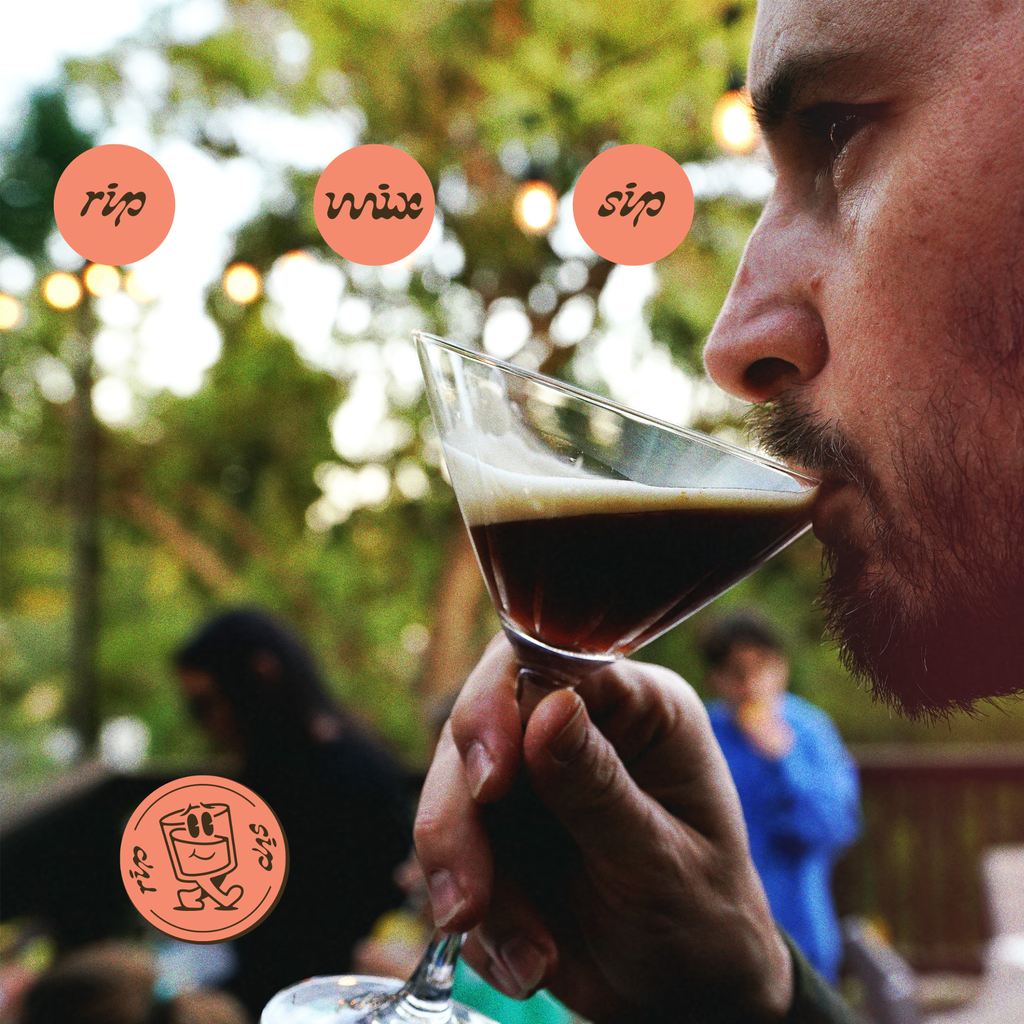 Man drinking a Stir Sessions Espresso Martini powdered cocktail or mocktail drink beverage in an outdoor setting.