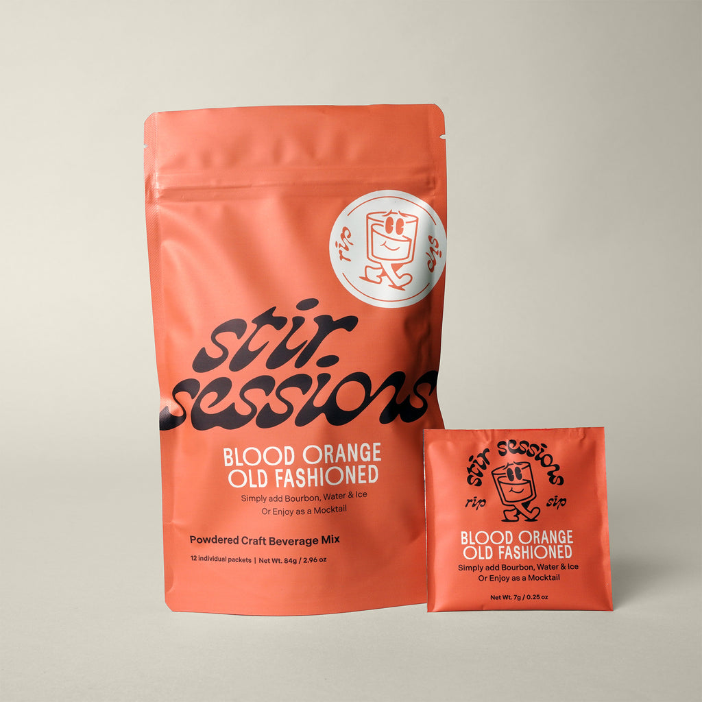 Stir Sessions Blood Orange Old Fashioned powdered cocktail or mocktail drink beverage mix packaging on a light gray background.