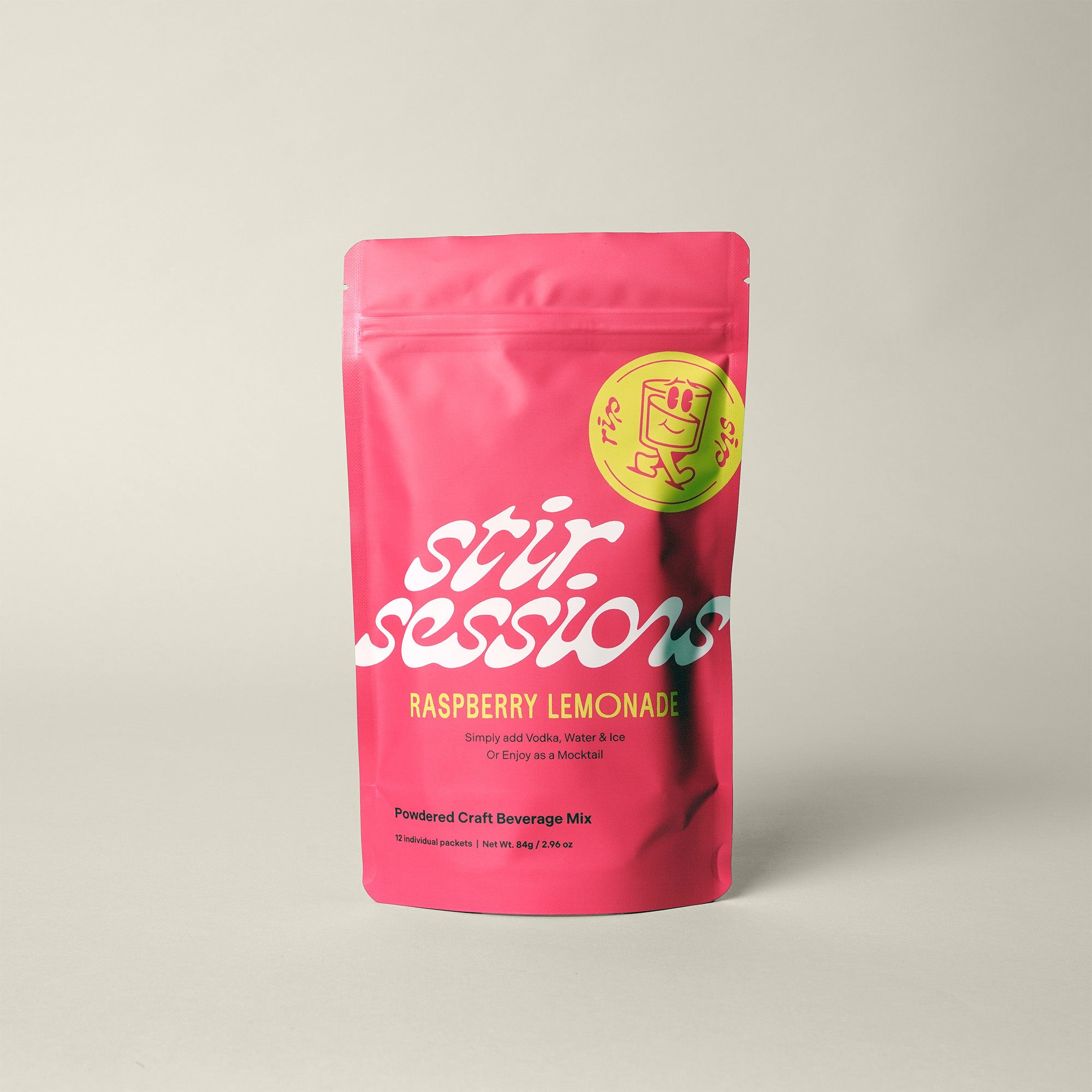 Stir Sessions Raspberry Lemonade powdered cocktail or mocktail drink beverage packaging on a light gray background. Front view of the 12 pack package. 
