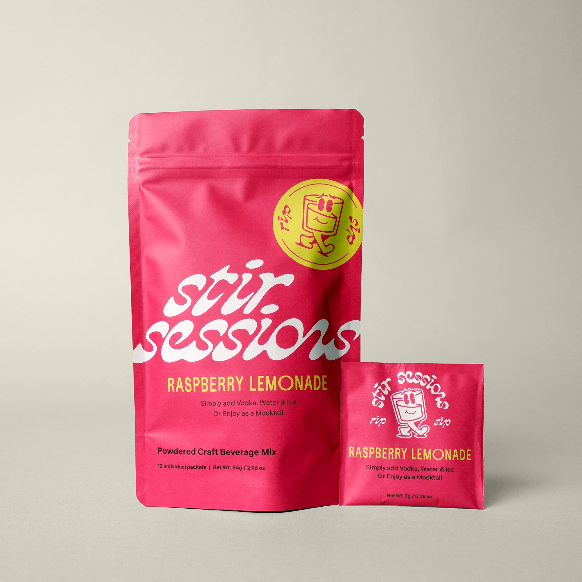 Stir Sessions Raspberry Lemonade powdered cocktail or mocktail drink beverage packaging on a light gray background. One 12 pack package and a single-serve packet. 